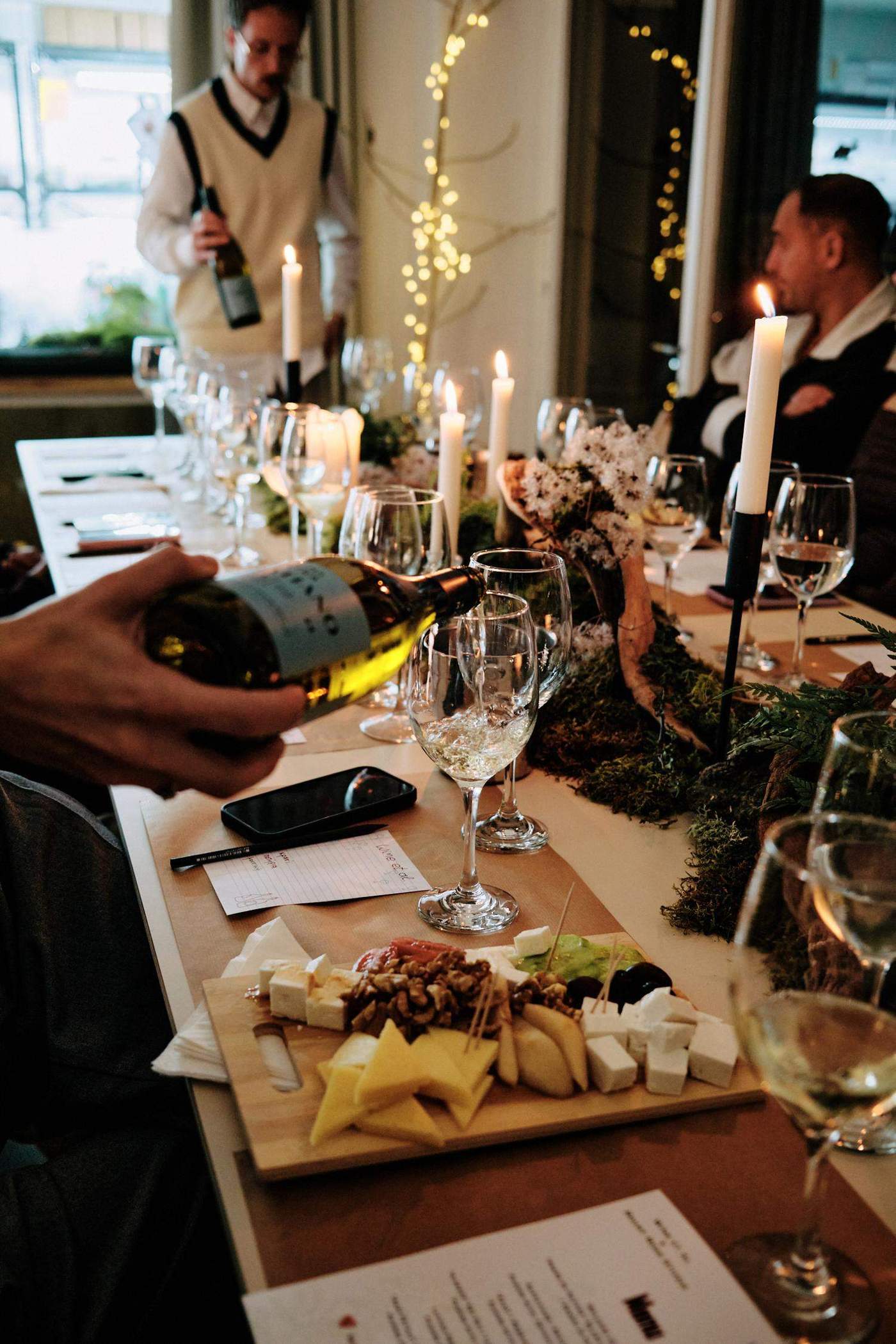 Wine being poured at intimate tasting